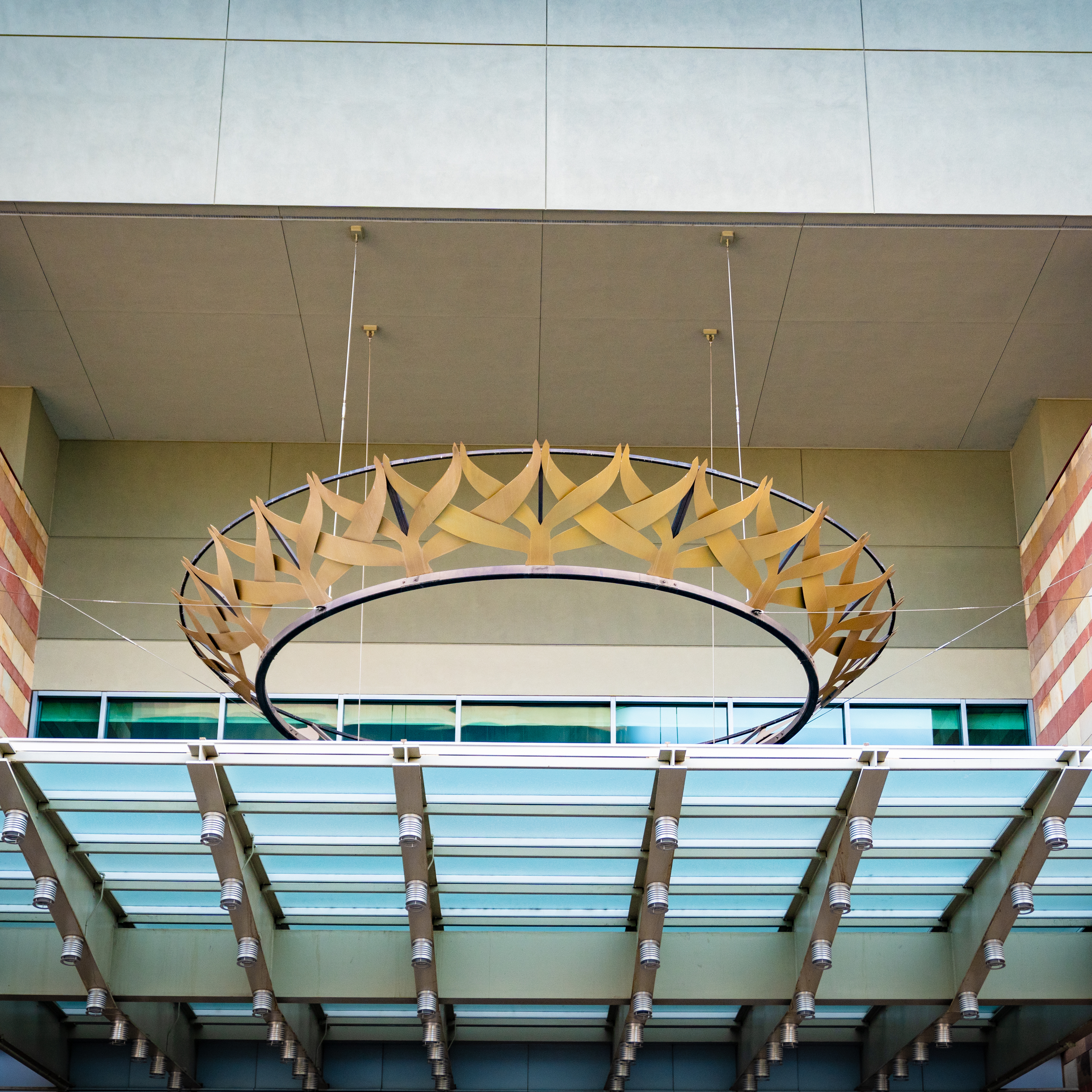 Crown shaped artwork hanging above an extrance tot he North Building