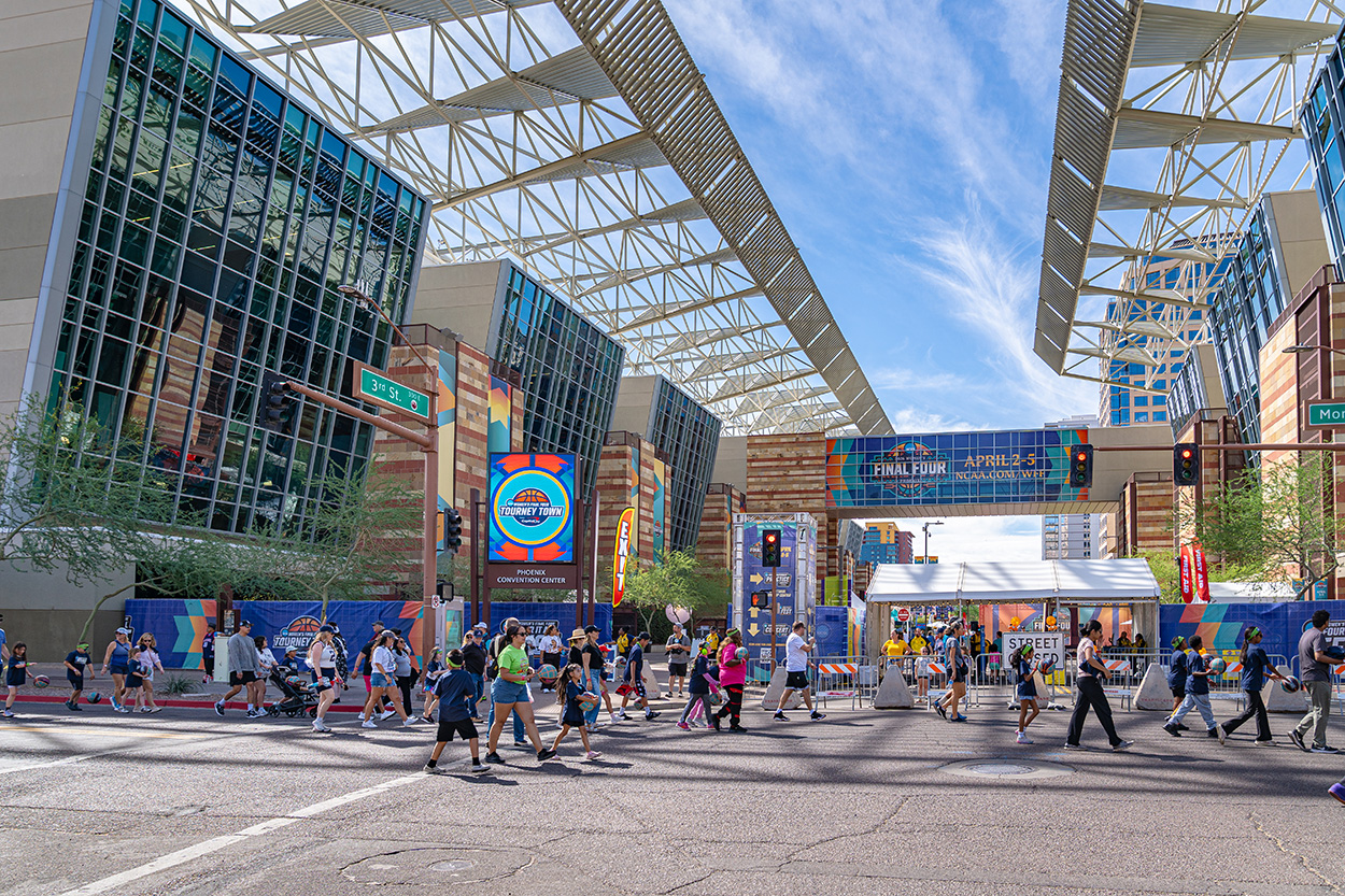 Photo of crowd crossing in front of the Phoenix Convention Center during Women's Final Four. 