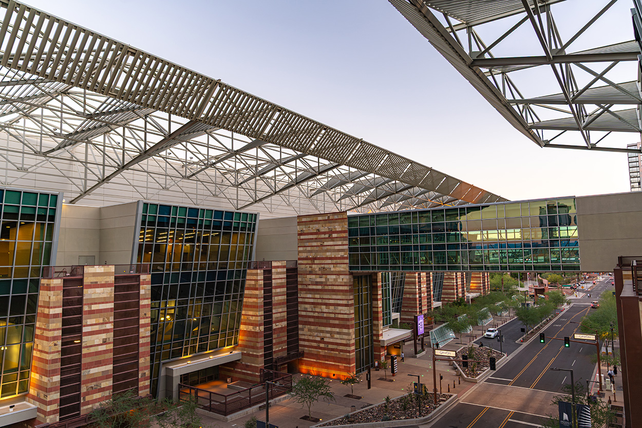Photo of the exterior of the Phoenix Convention Center looking at the North Building and the bridge.